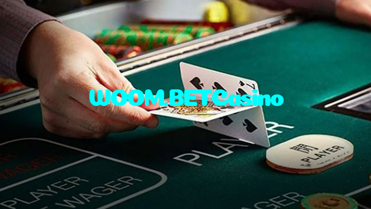 WOOM.BETCasino casino presented on mobile device in Pakistan with slots and live games